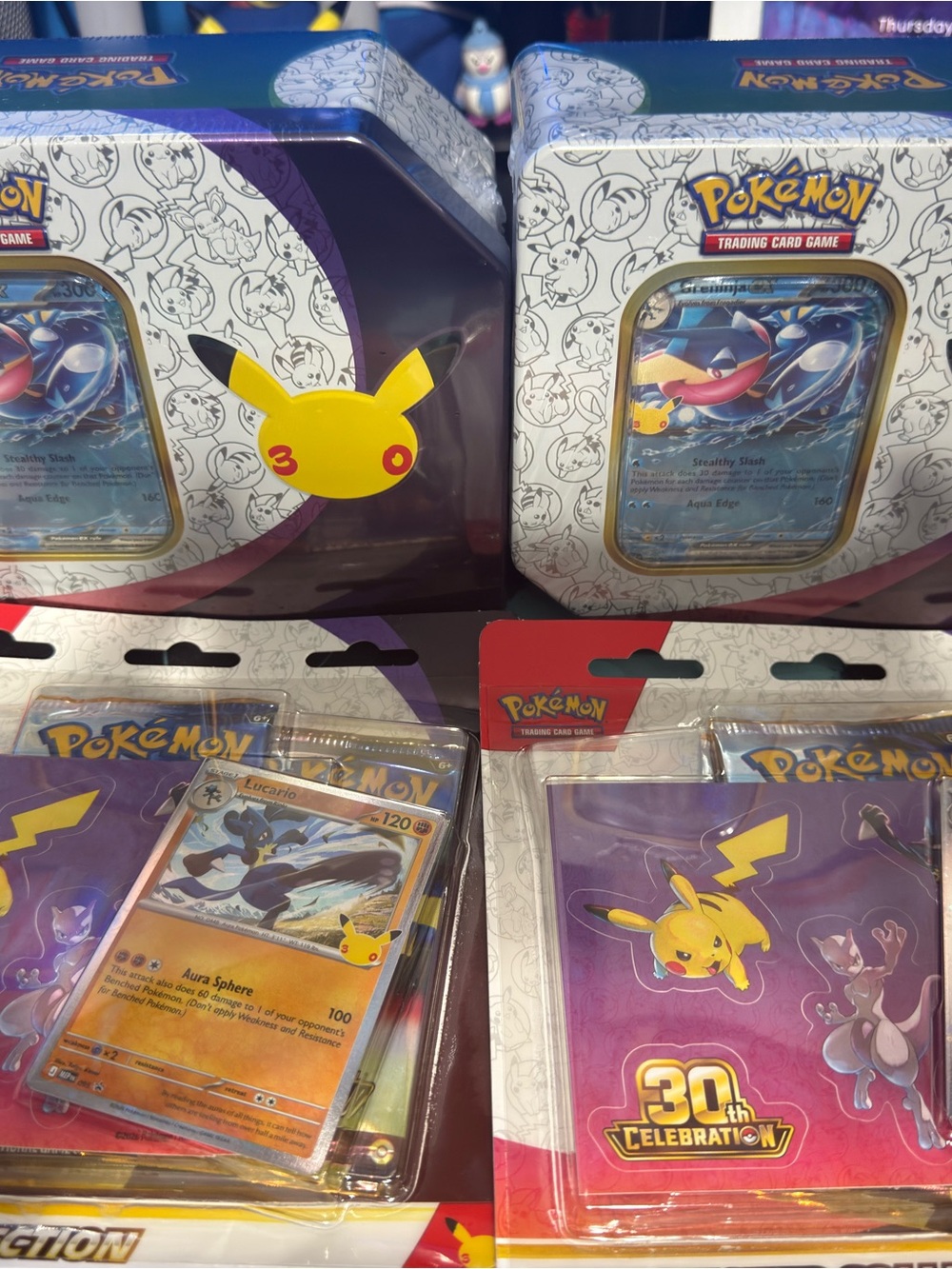 Pokémon 30th Anniversary Celebration Bundle – 2 Sticker Collections + 2 Tins